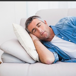 Man sleeping on a couch