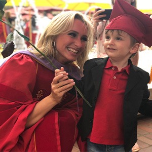Dr. Ducharme and kid at graduation