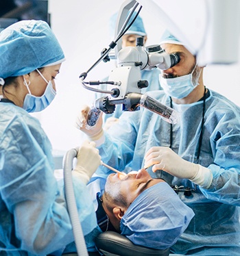 dentists performing dental implant salvage in Jupiter