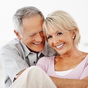 Smiling older man and woman