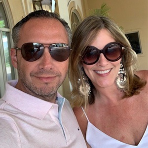 Dr. Guzman and wife smiling
