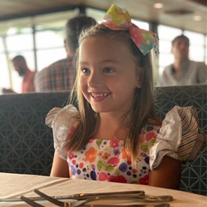 Dr. Guzman's daughter smiling