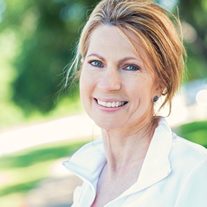 Older woman outdoors smiling