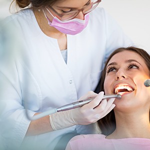 Woman receiving dental exam