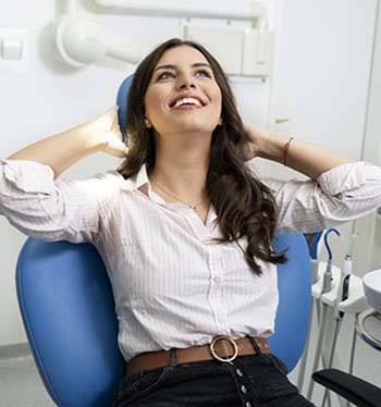Woman relaxing at dentist’s office with sedation dentistry in Jupiter