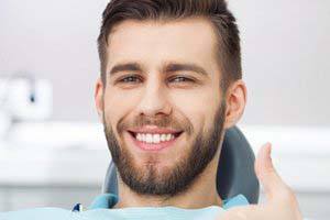 Man gives a thumbs up after IV dental sedation in Jupiter