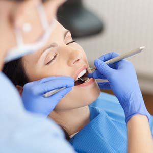 Closeup of woman visiting her Jupiter sedation dentist