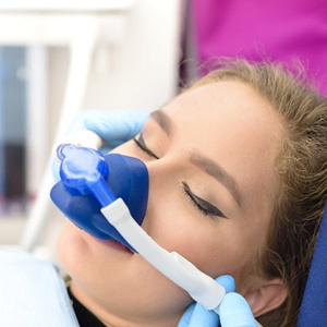 Patient relaxing with the help of nitrous oxide dental sedation