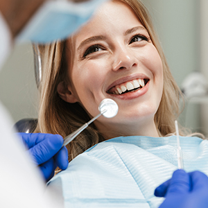 Smiling patient in dental chair