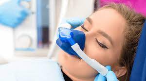 patient wearing nitrous oxide nose mask