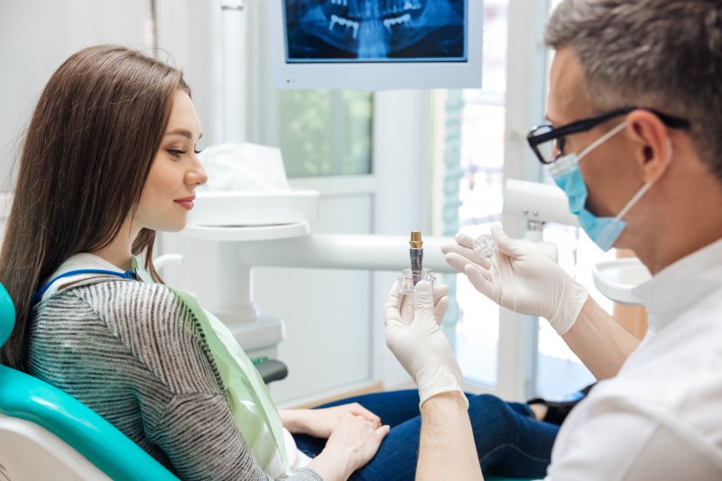 A patient wondering about dental implants in Jupiter 