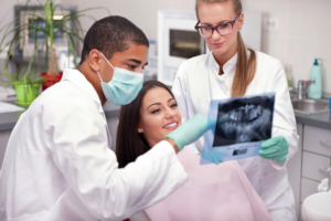 a patient visiting their dentist for a consultation